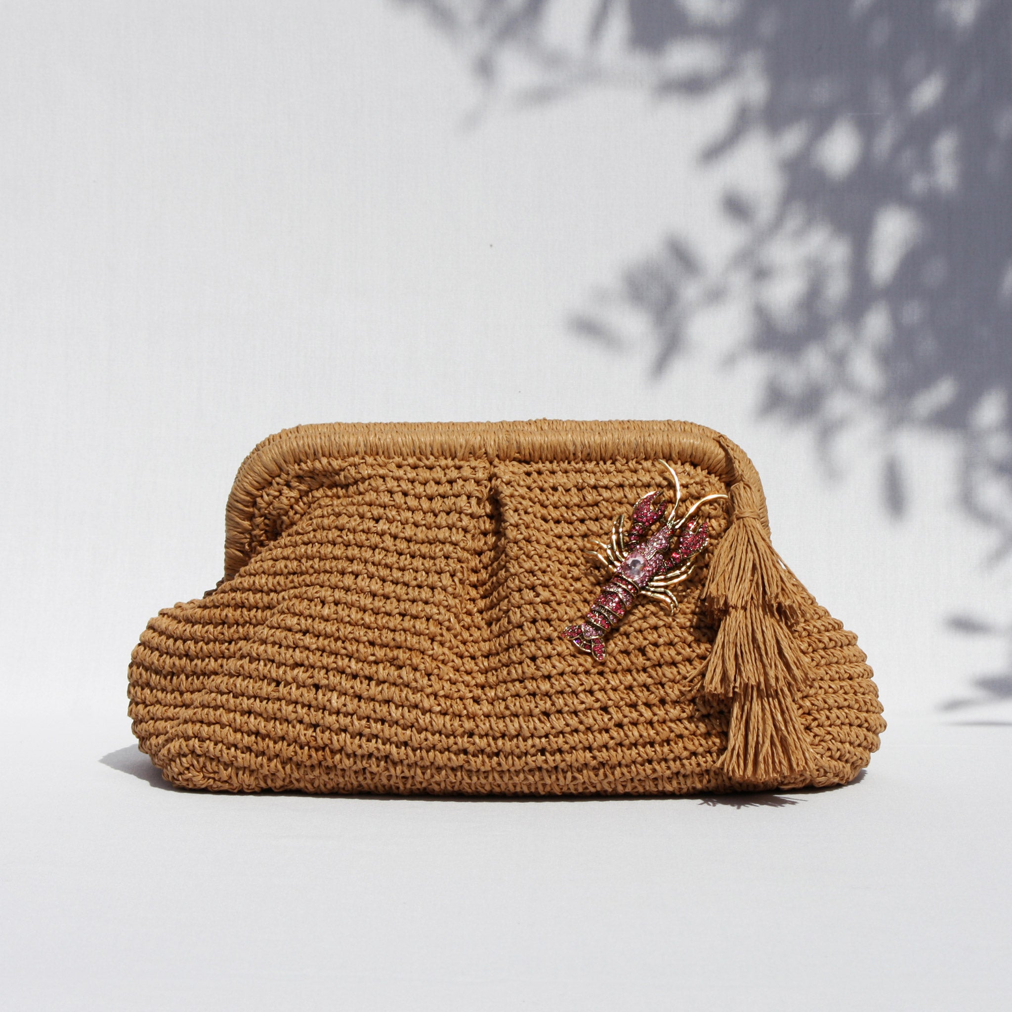 AMARA LOBSTER CLUTCH BAG- SAND