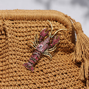 AMARA LOBSTER CLUTCH BAG- SAND