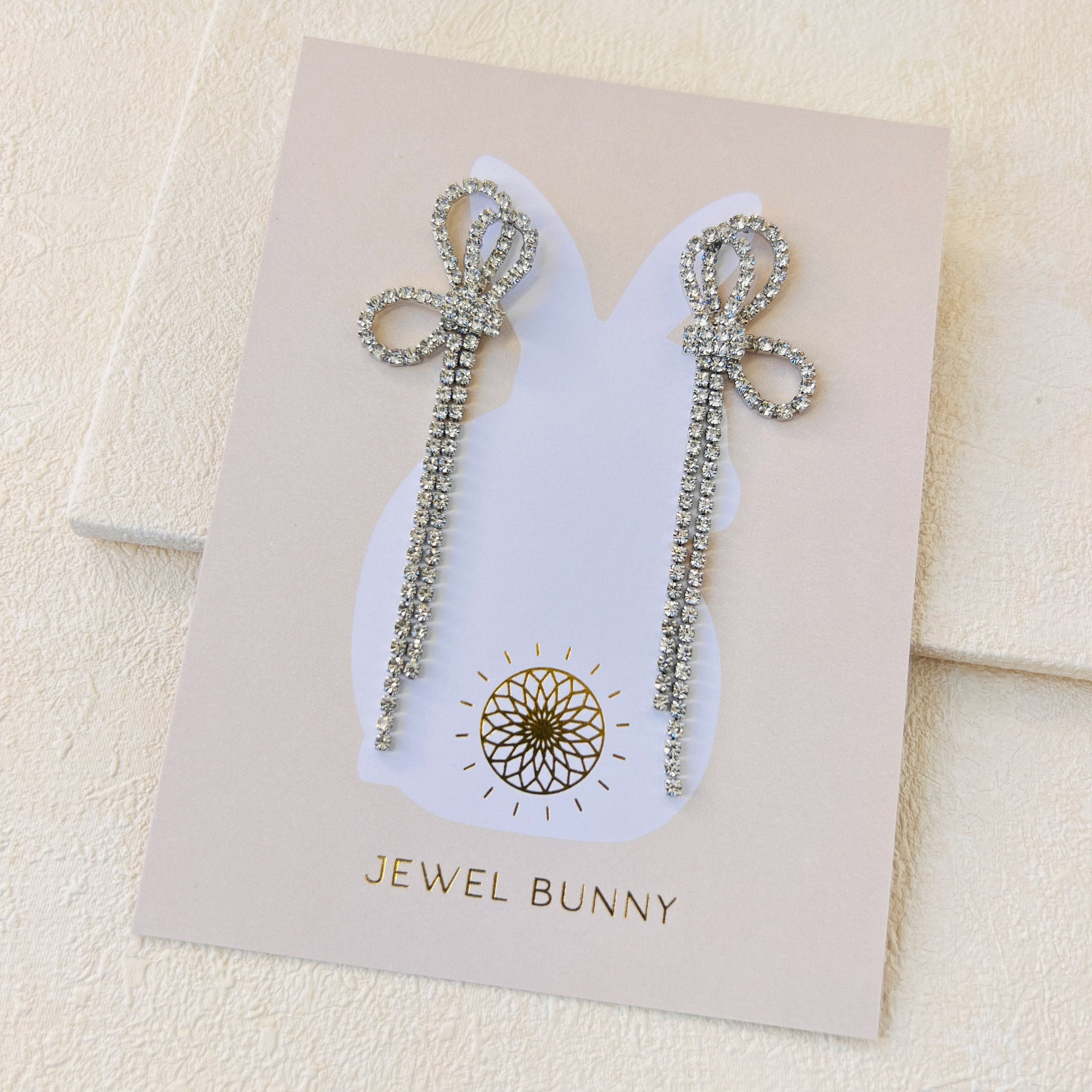 BOW EARRINGS- SILVER