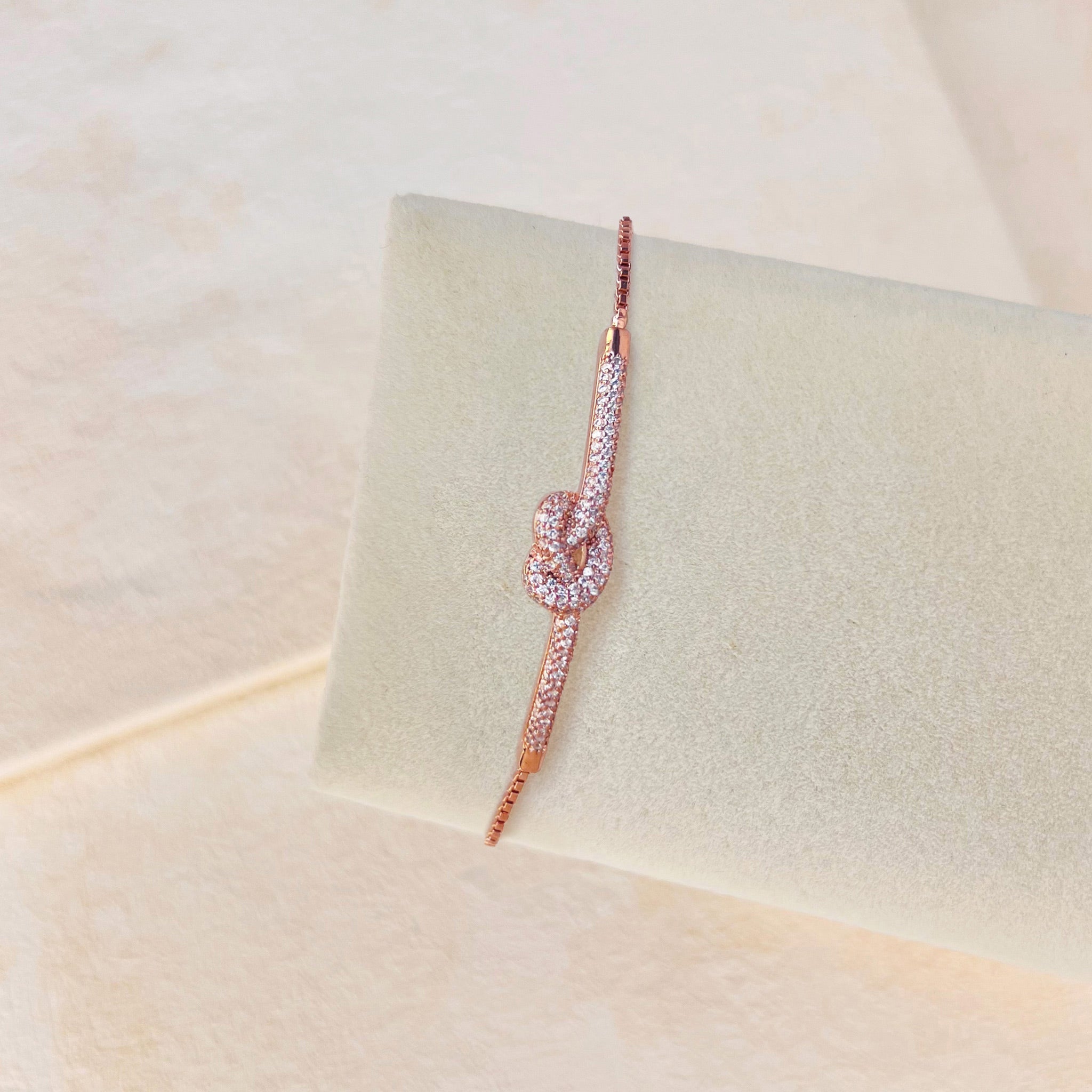 TWIST KNOT STACKING BRACELET - ROSE GOLD